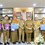 Wabup Intan Simbolis Serahkan 334 SK Kenaikan Pangkat dan 39 SK Pensiun