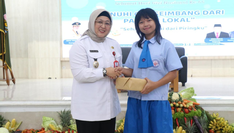 Intan Nurul Hikmah membuka seminar pemenuhan gizi